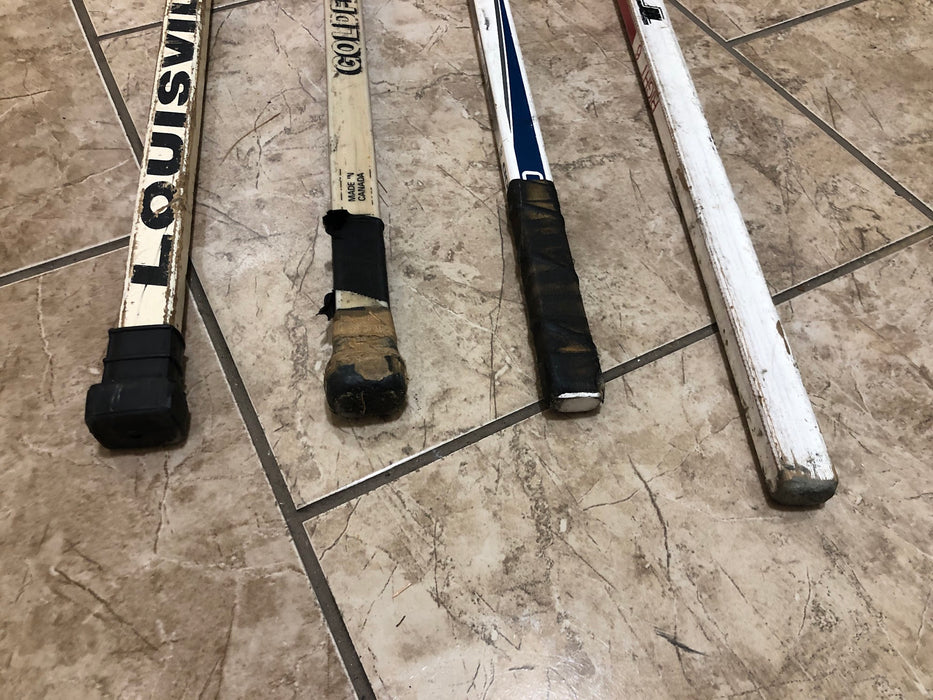 Lot of Hockey Sticks & Shin Pads