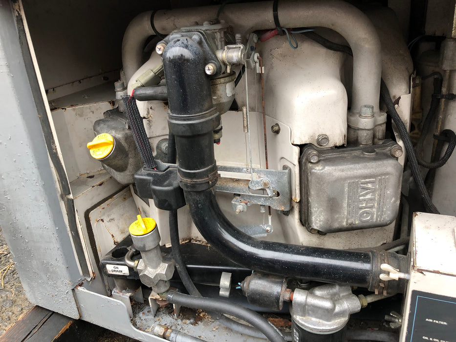 004704-0 Generac Quietpact 65G Gasoline RV Generator (Used, for Parts or Repair)