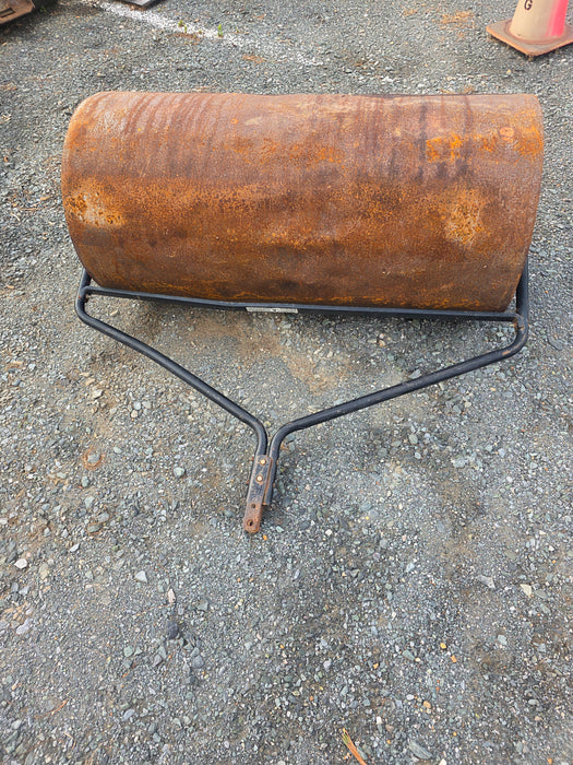 4 Foot pull behind metal lawn roller (Used)