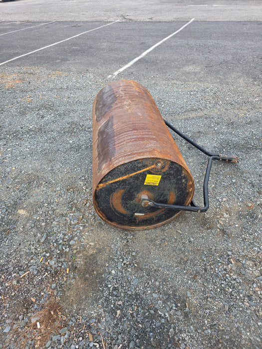 4 Foot pull behind metal lawn roller (Used)